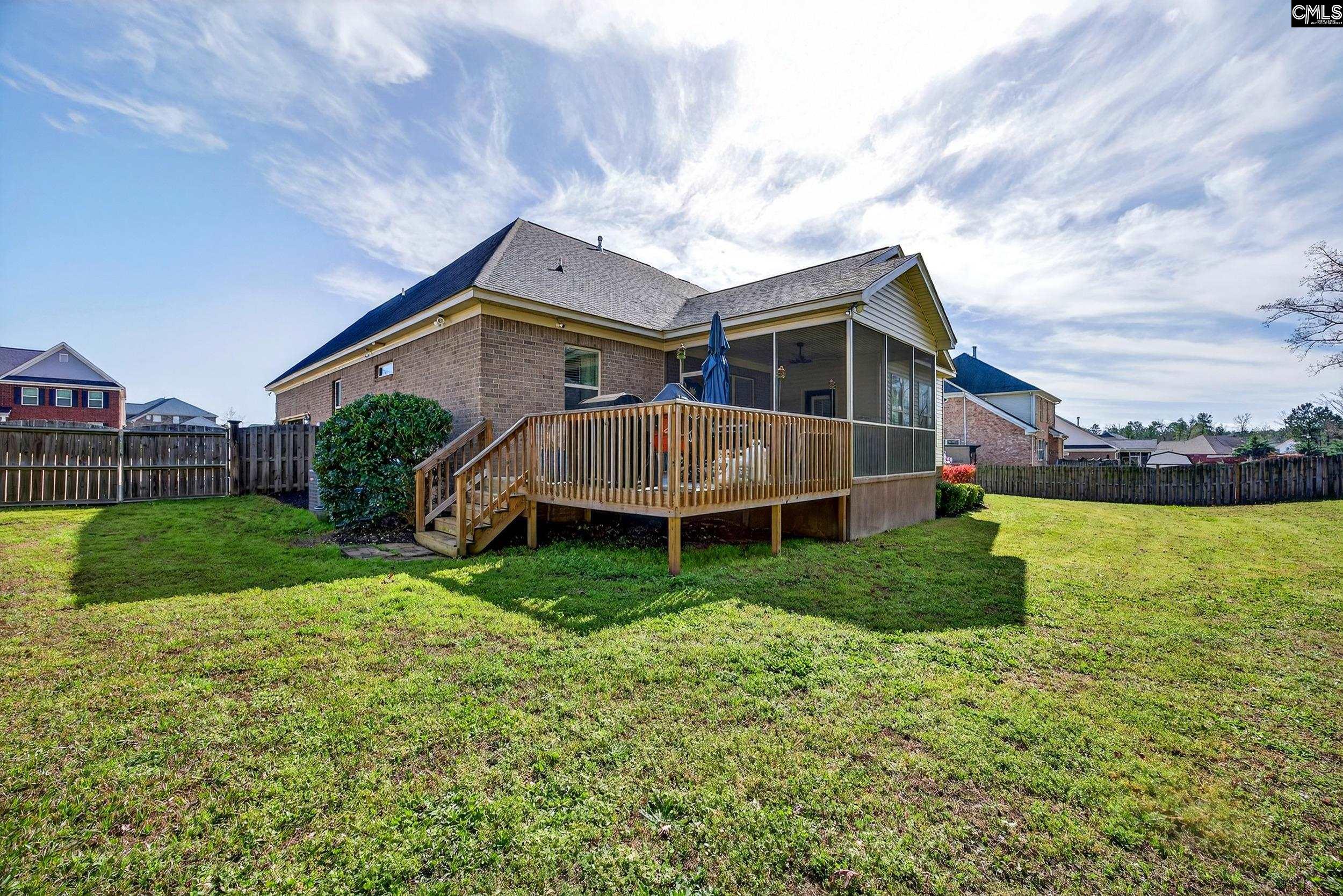 116 Renard Way Gilbert, SC 29054 - Photo 54 of 74 a view of a house with a yard