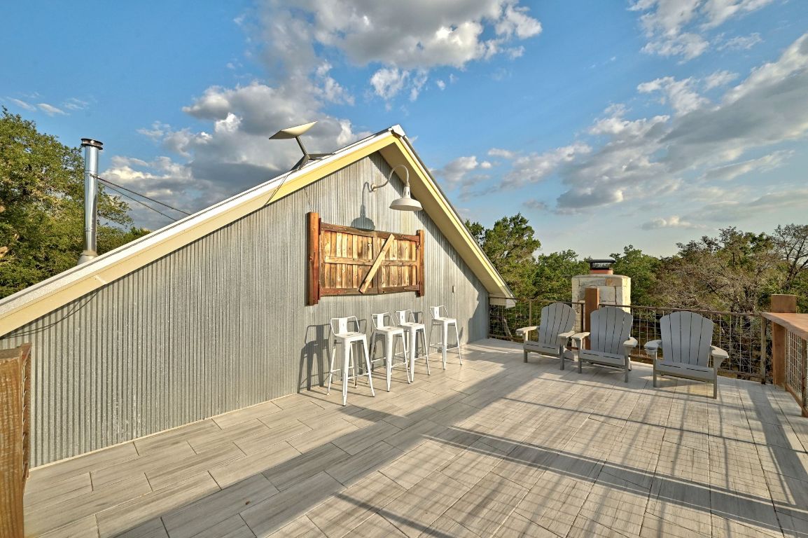 1910 Sandy Point Road Wimberley, TX 78676 - Photo 11 of 40 a view of sitting area on roof deck