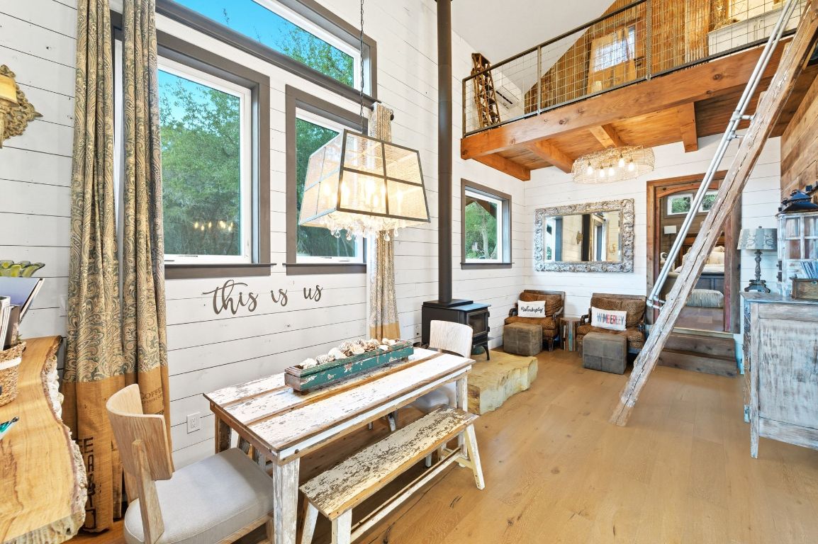 1910 Sandy Point Road Wimberley, TX 78676 - Photo 15 of 40 a living room with furniture and a window