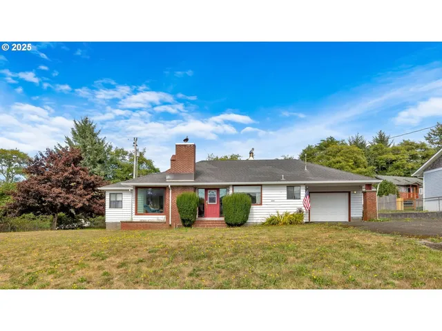 a black and white photo of a house
