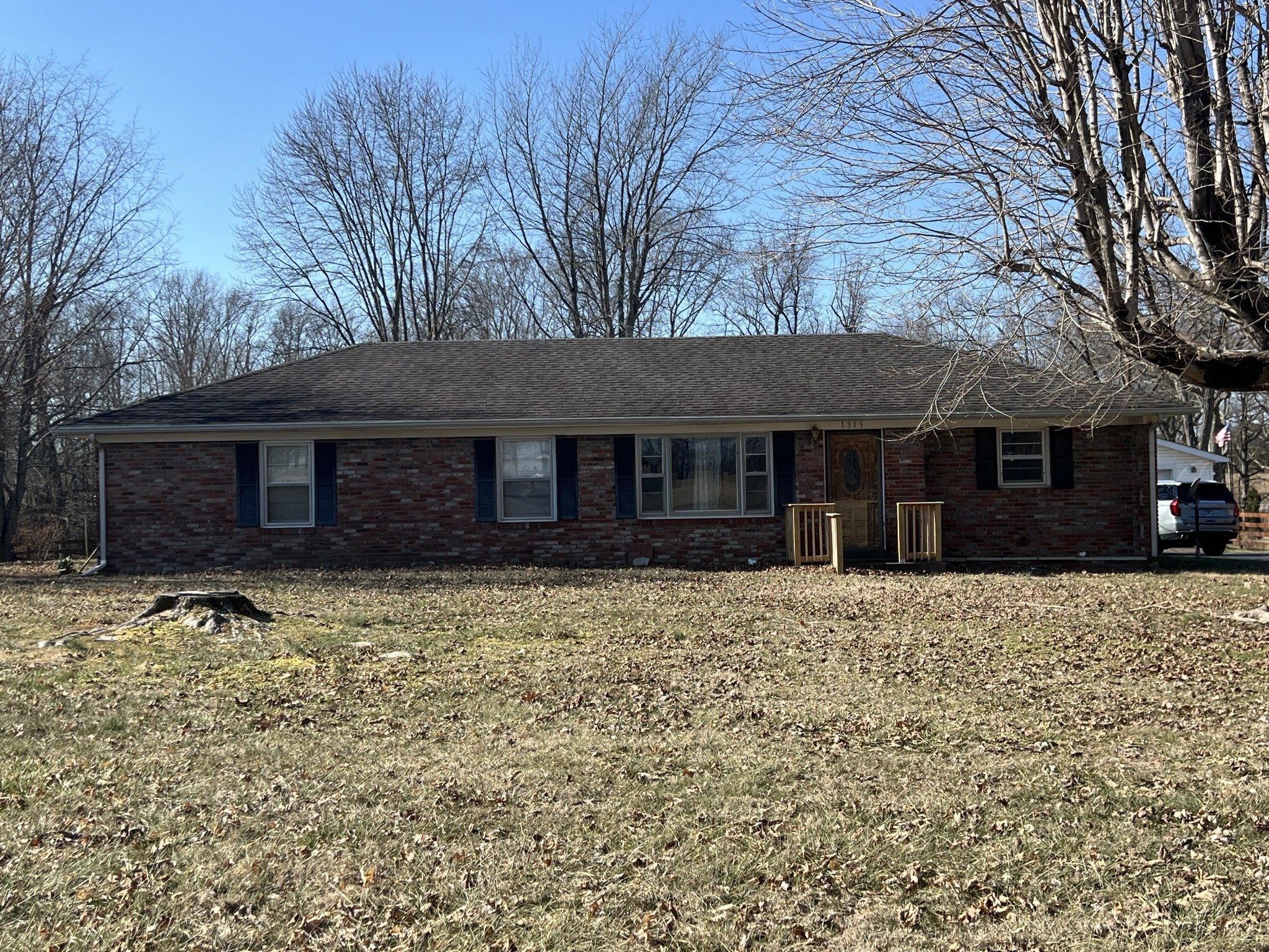 1315 Academy Road Portland, TN 37148 - Photo 1 of 29 a front view of a house with a yard