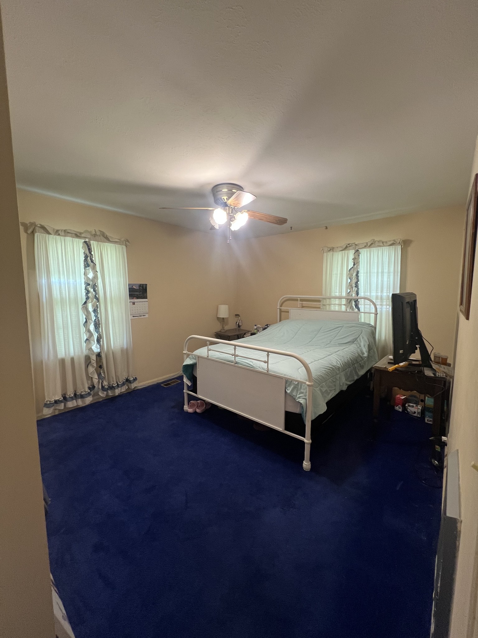 1315 Academy Road Portland, TN 37148 - Photo 18 of 29 a bedroom with a bed and window
