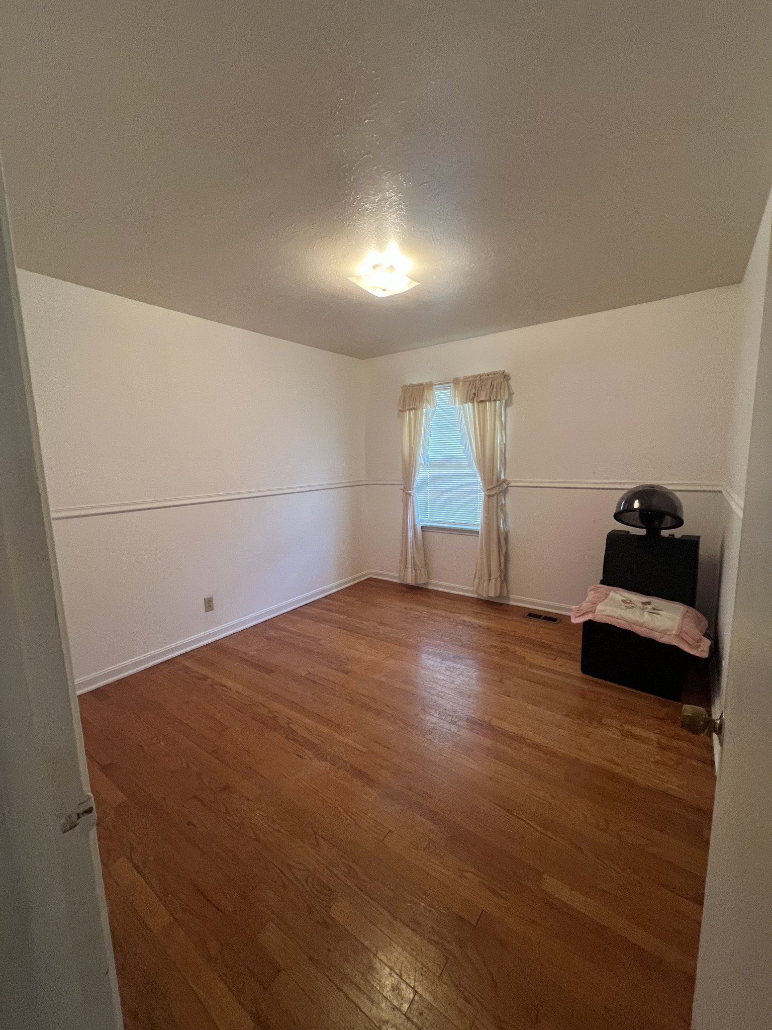1315 Academy Road Portland, TN 37148 - Photo 20 of 29 a view of empty room with wooden floor