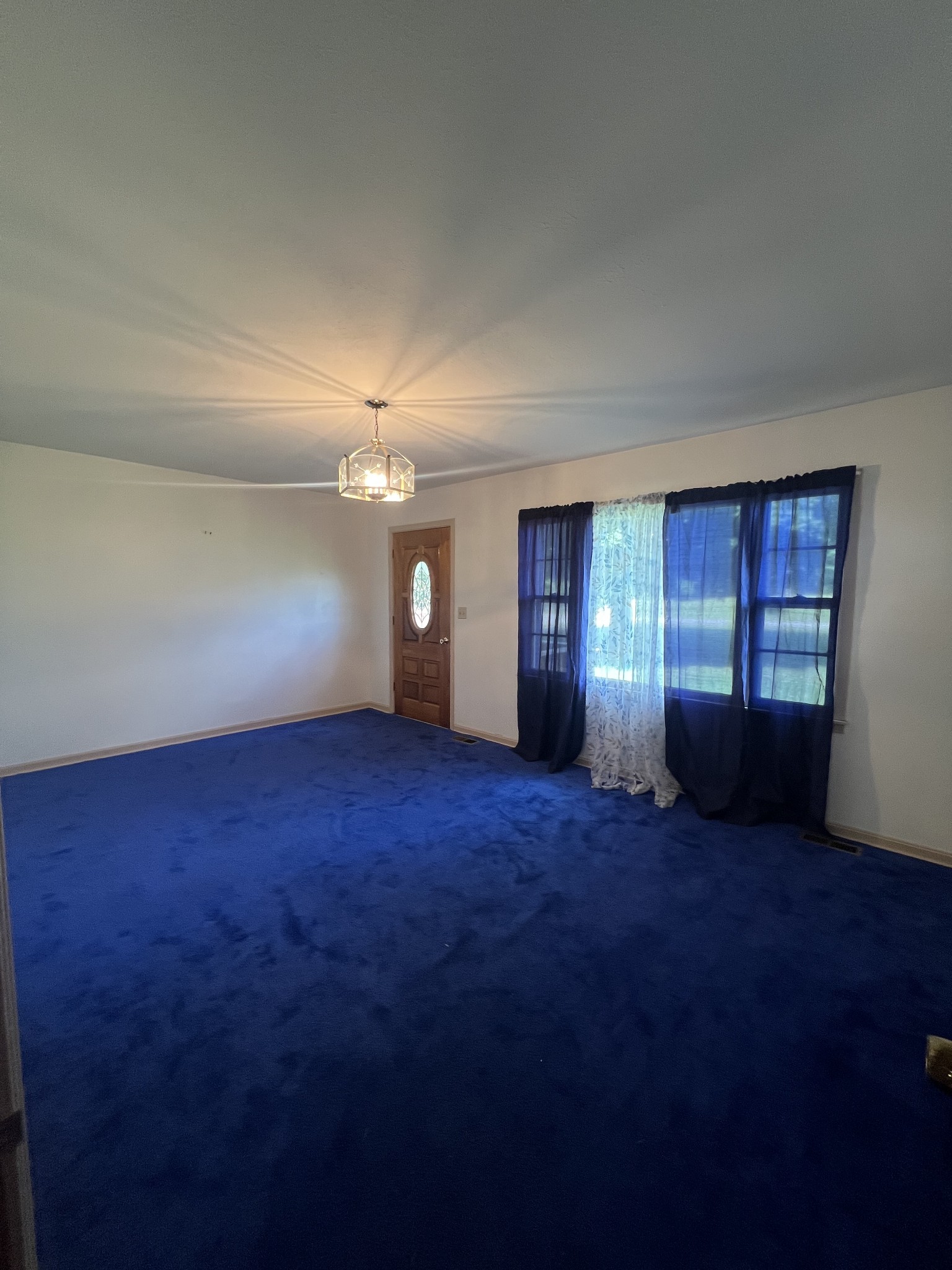 1315 Academy Road Portland, TN 37148 - Photo 22 of 29 a view of empty room with window and fireplace