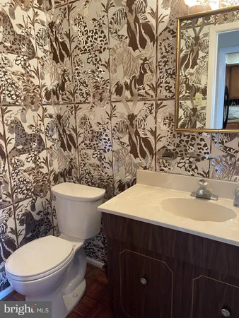 a bathroom with a sink and a toilet