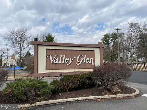 a sign broad on the side of a road