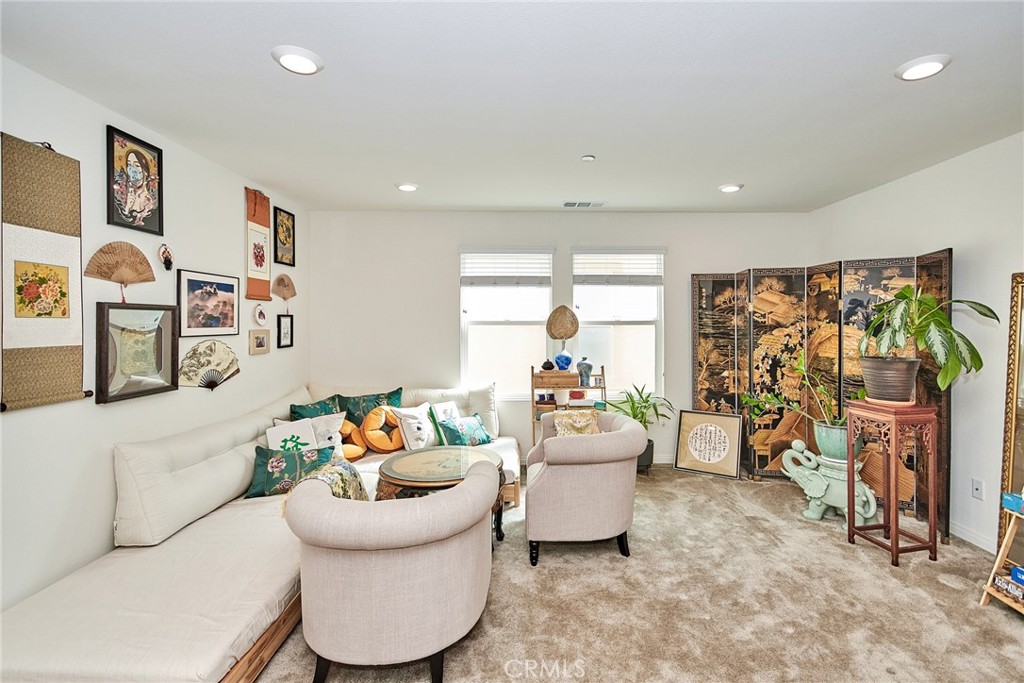 2375 Vineyard Street Upland, CA 91786 - Photo 14 of 58 a living room with furniture and a flat screen tv