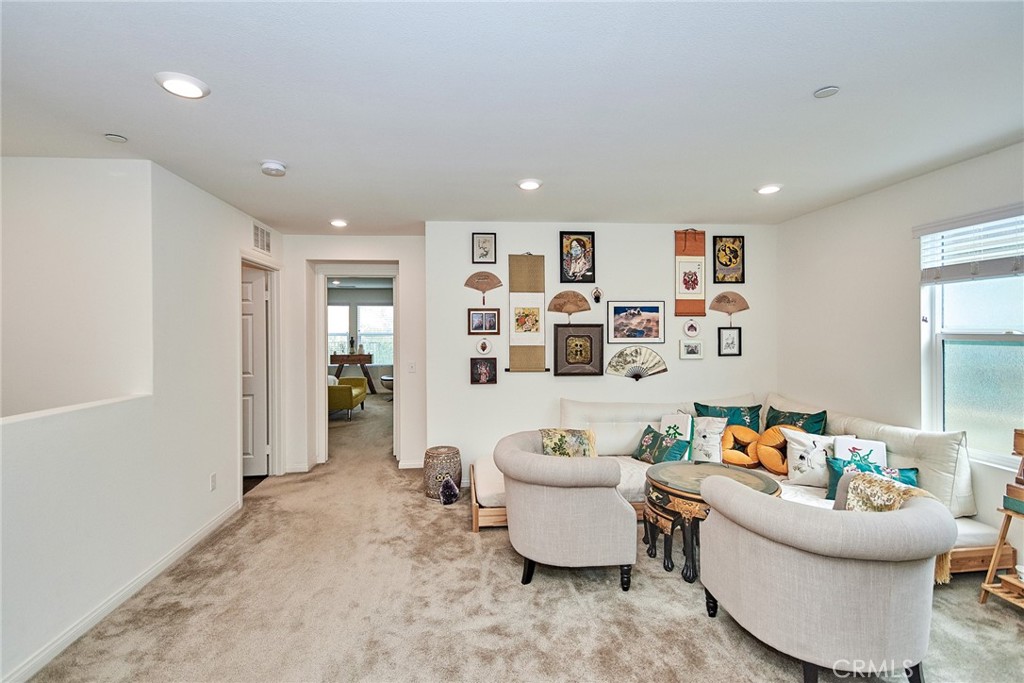 2375 Vineyard Street Upland, CA 91786 - Photo 15 of 58 a living room with furniture and a table