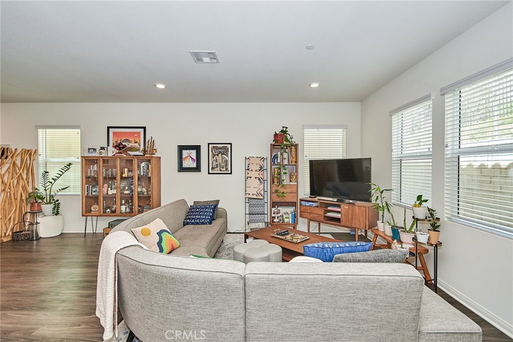 2375 Vineyard Street Upland, CA 91786 - Photo 23 of 58 a living room with furniture and a flat screen tv
