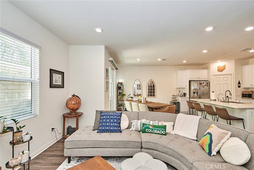 2375 Vineyard Street Upland, CA 91786 - Photo 24 of 58 a living room with furniture kitchen view and a large window
