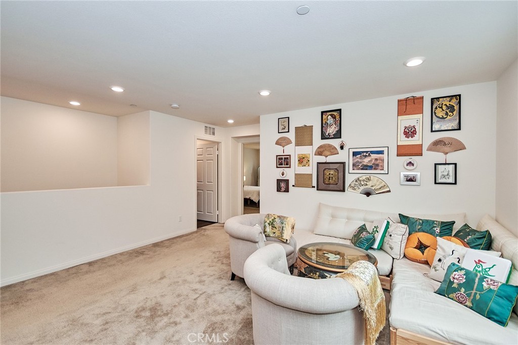 2375 Vineyard Street Upland, CA 91786 - Photo 37 of 58 a living room with furniture and white walls