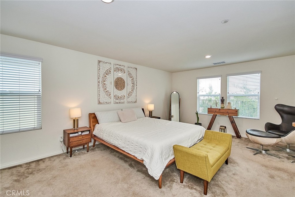 2375 Vineyard Street Upland, CA 91786 - Photo 44 of 58 a bedroom with a bed and a large window