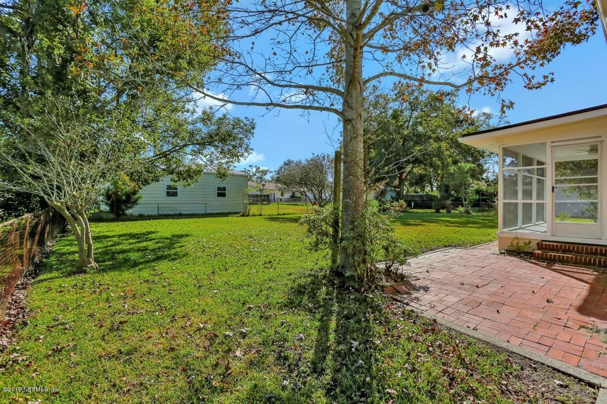 731 Acapulco Road Jacksonville, FL 32216 - Photo 17 of 18 Paved Patio Outside Screen Porch