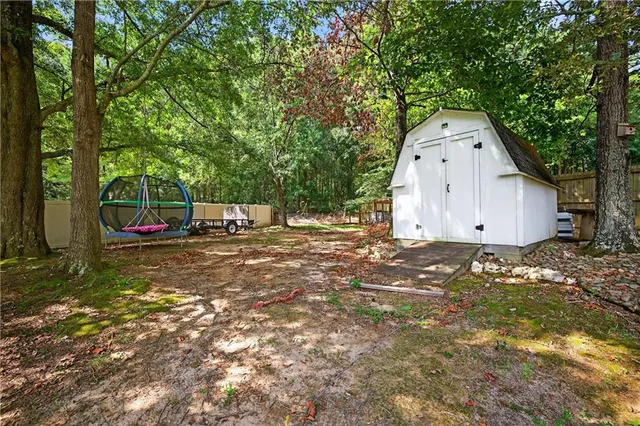 a view of backyard with green space