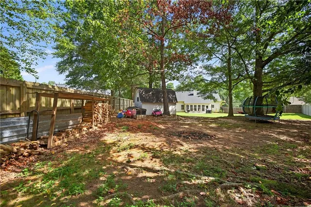 a view of street with parked cars