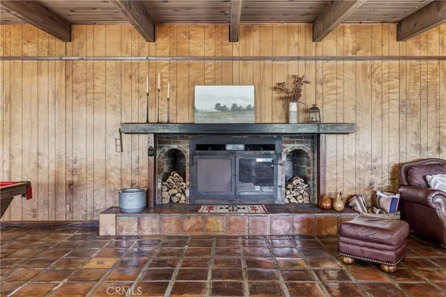 a room with furniture and a fireplace