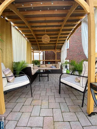 a view of a lounge chairs in a patio
