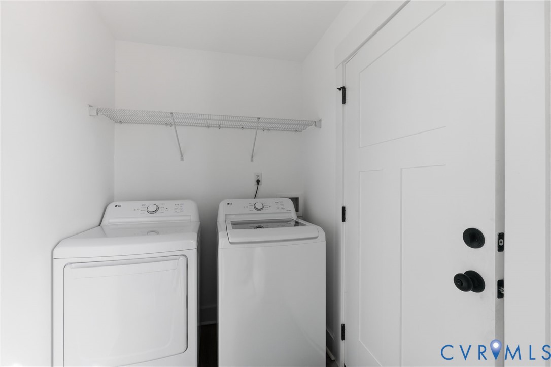 5245 Courtland Road Disputanta, VA 23842 - Photo 12 of 27 a utility room with dryer and washer