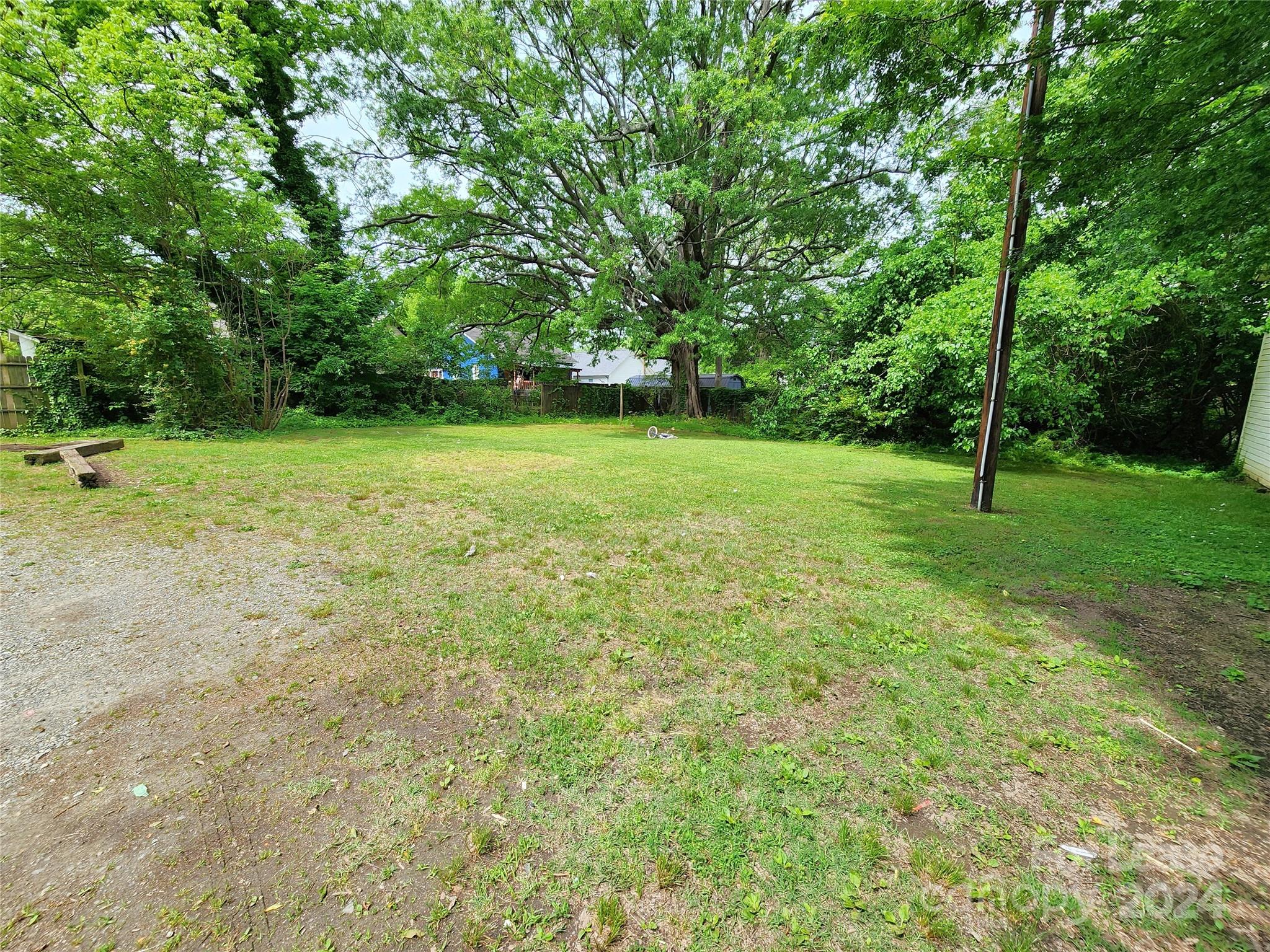 1126 South Fulton Street, Unit B Salisbury, NC 28144 - Photo 17 of 17 a view of field with trees in the background
