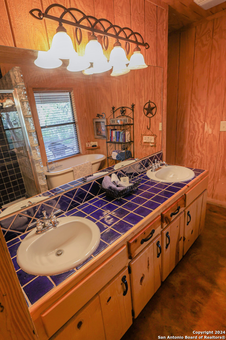 1177 River Road Concan, TX 78838 - Photo 17 of 34 a view of a two chairs in the kitchen