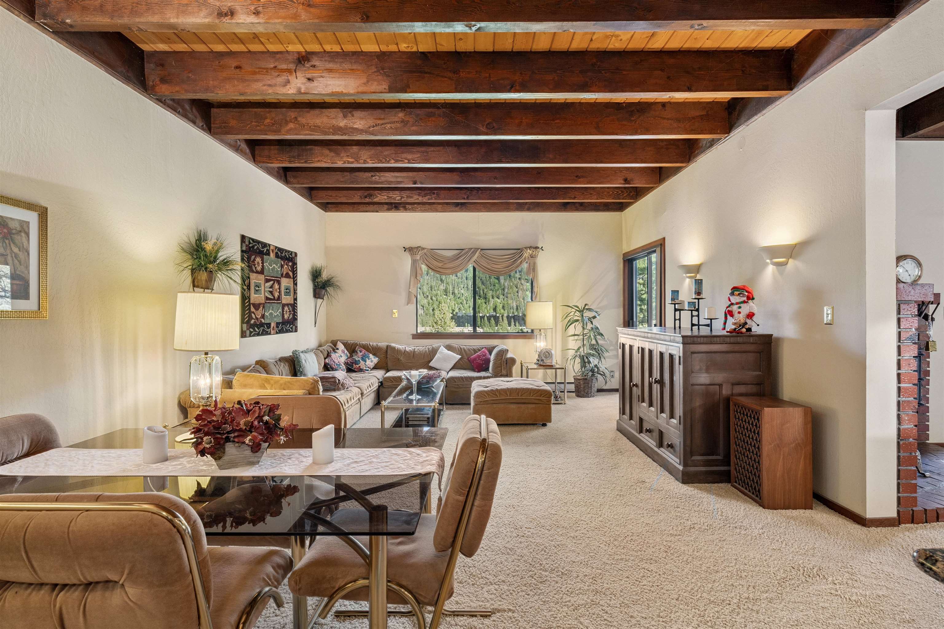 1449 Sandy Way Olympic Valley, CA 96146 - Photo 11 of 27 a living room with furniture and a large window