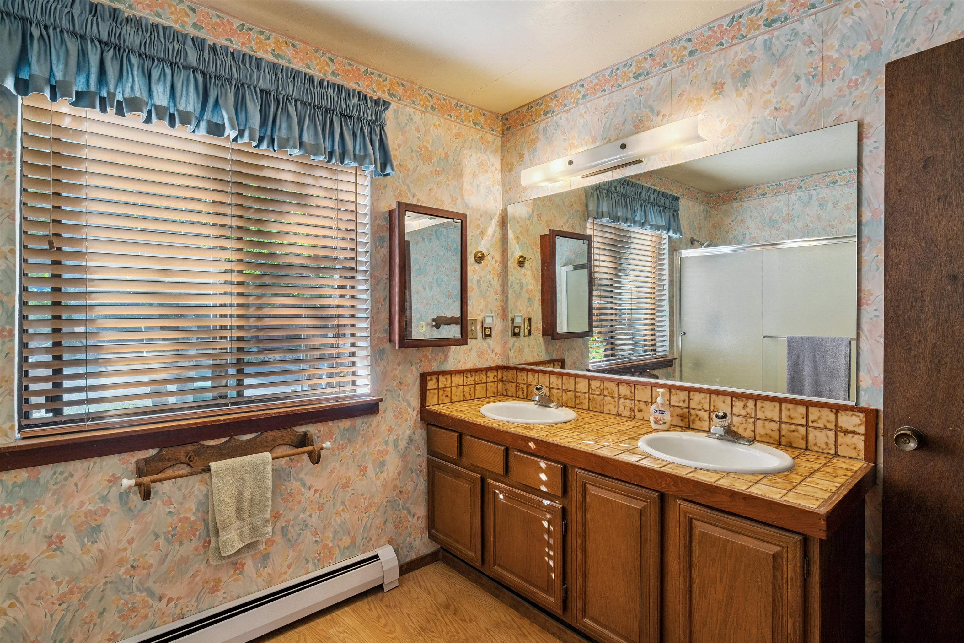 1449 Sandy Way Olympic Valley, CA 96146 - Photo 22 of 27 a bathroom with a sink and a mirror