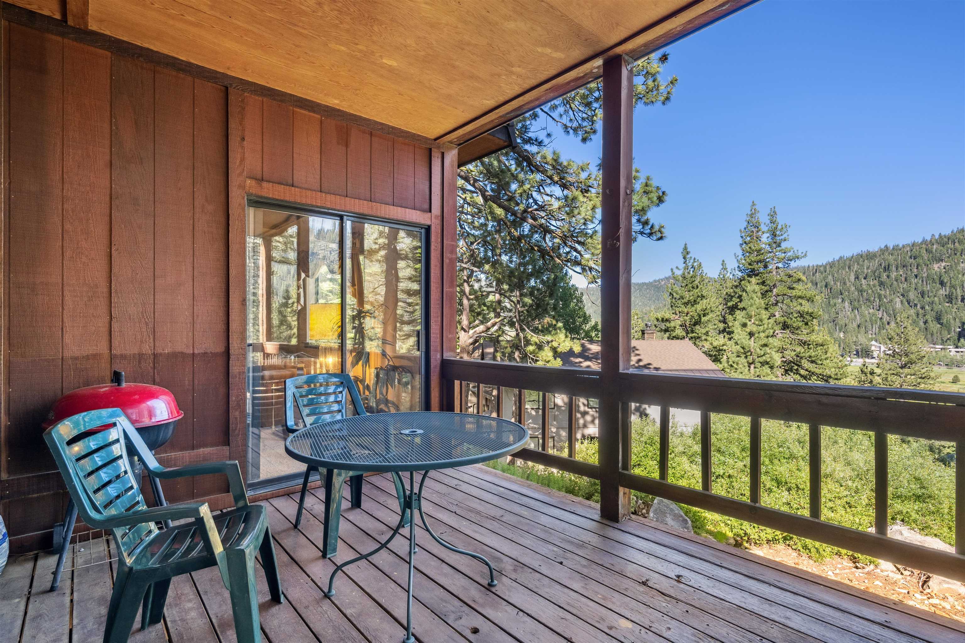 1449 Sandy Way Olympic Valley, CA 96146 - Photo 5 of 27 a view of a balcony with furniture and wooden floor