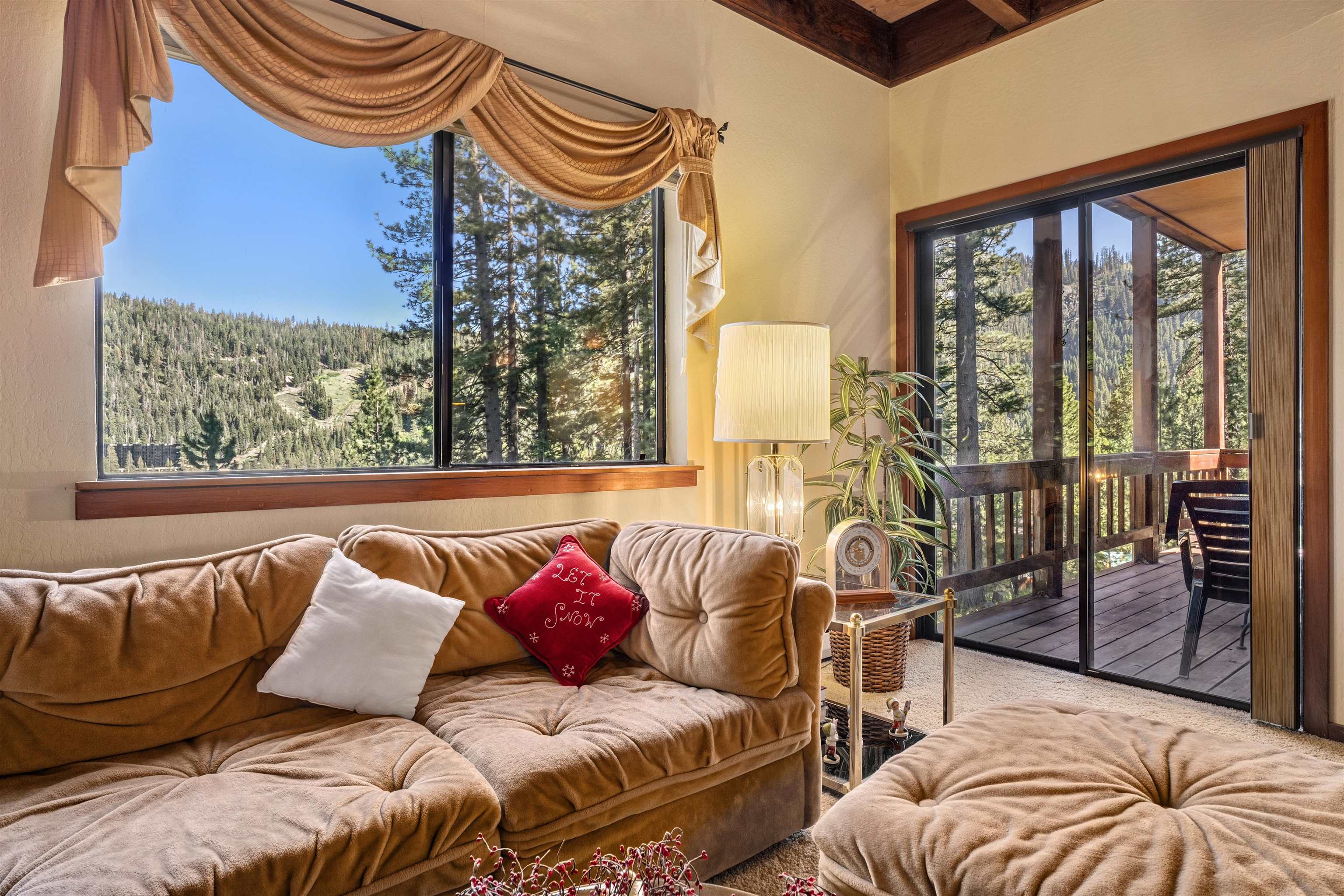 1449 Sandy Way Olympic Valley, CA 96146 - Photo 6 of 27 a living room with furniture and a floor to ceiling window