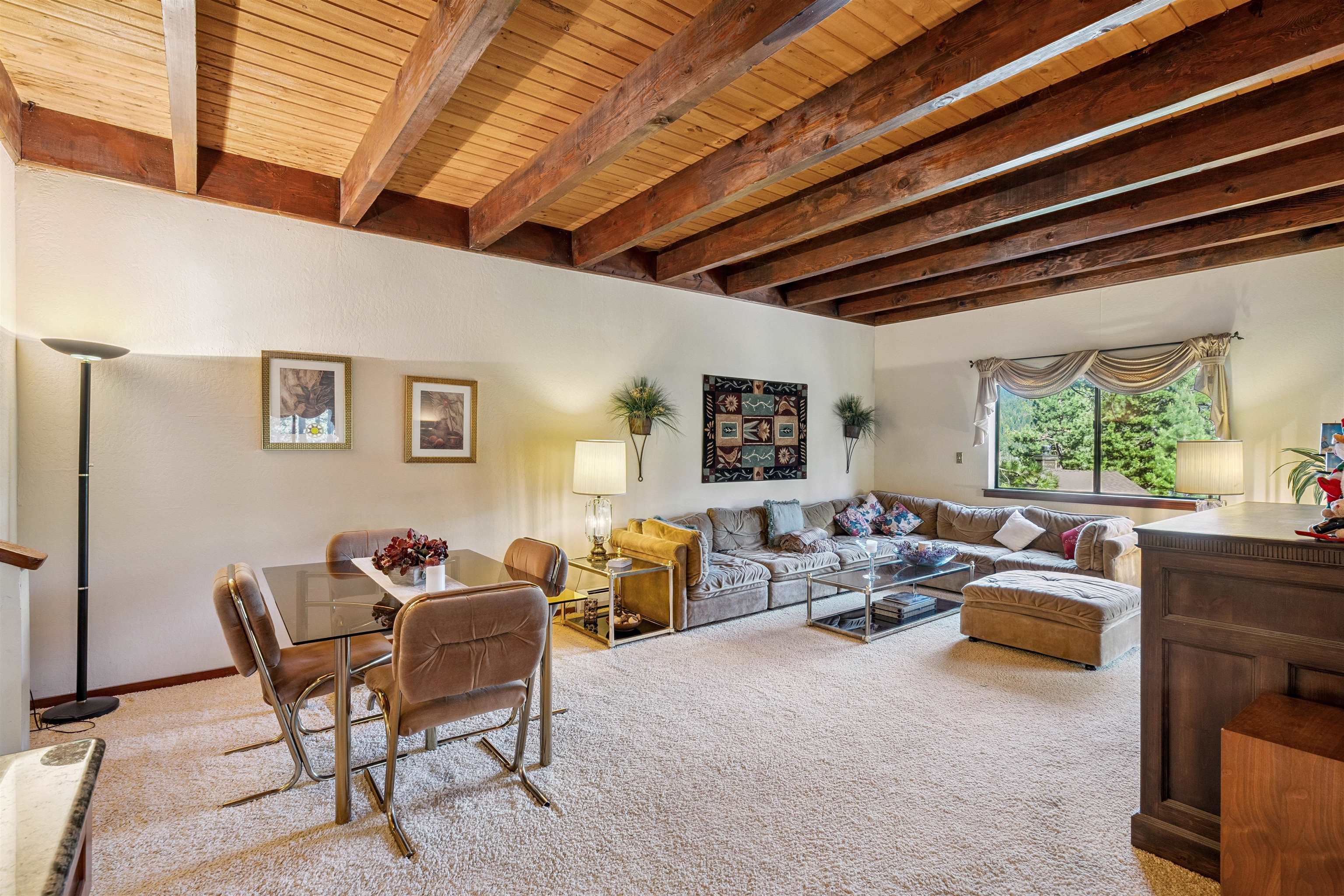 1449 Sandy Way Olympic Valley, CA 96146 - Photo 10 of 27 a living room with furniture and a large window