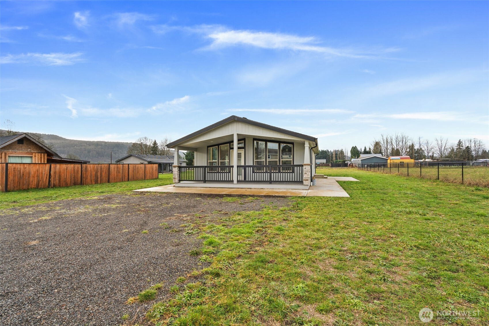 210 Mossyrock Road West Mossyrock, WA 98564 - Photo 11 of 38 a view of an house with backyard space and balcony