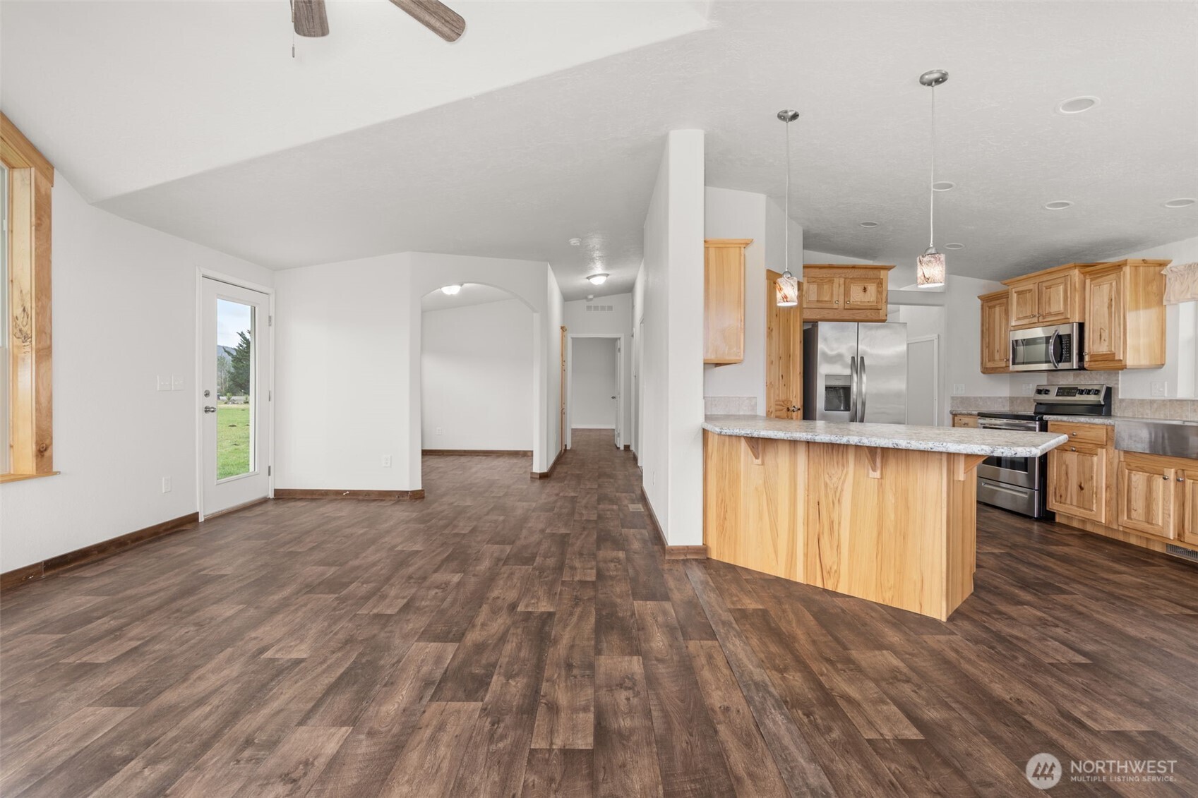 210 Mossyrock Road West Mossyrock, WA 98564 - Photo 14 of 38 a view of kitchen and kitchen with wooden floor