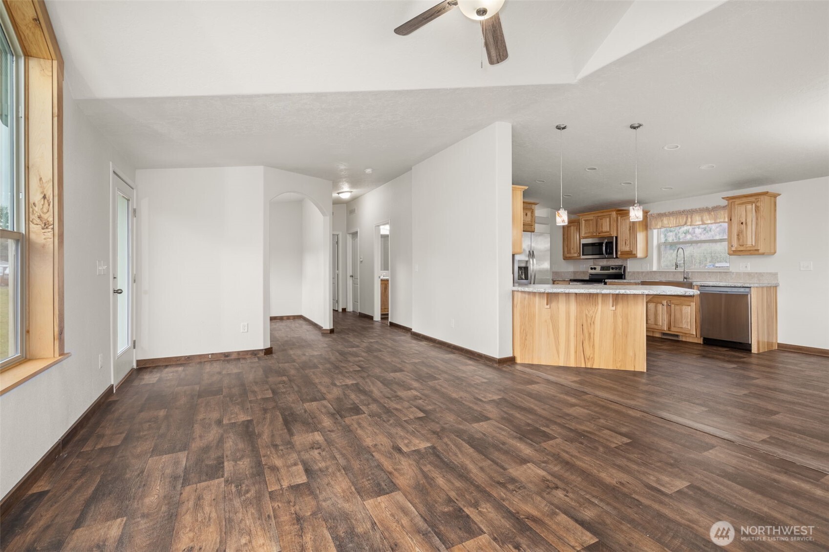 210 Mossyrock Road West Mossyrock, WA 98564 - Photo 16 of 38 a view of a kitchen with a sink and a stove top oven