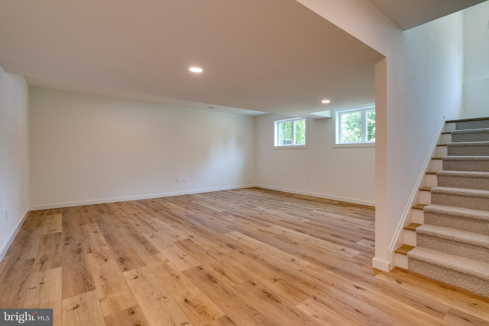 301 Fletcher Drive Lititz, PA 17543 - Photo 16 of 17 wooden floor in an empty room with a window