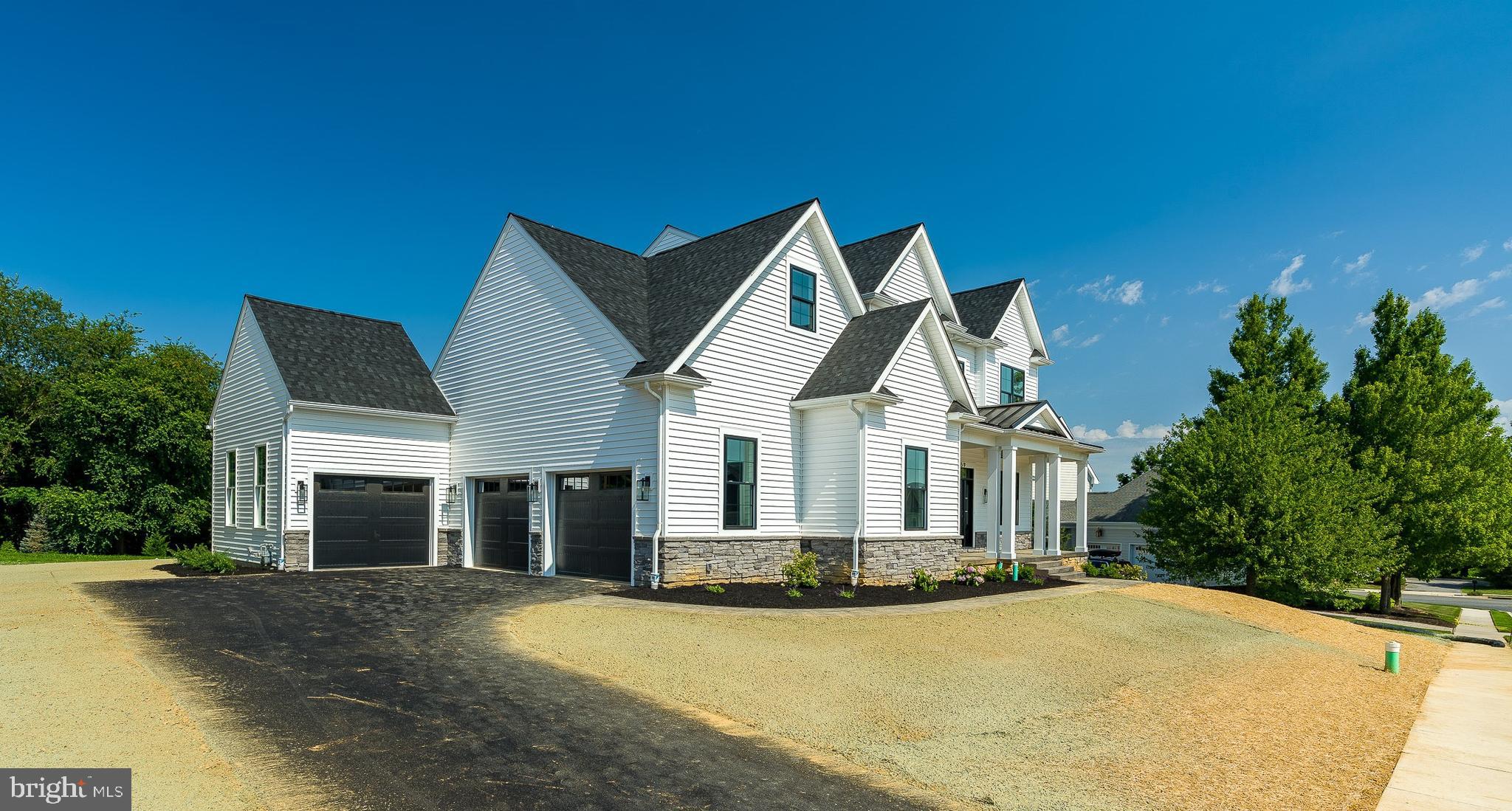 301 Fletcher Drive Lititz, PA 17543 - Photo 17 of 17 a view of a house with yard and garage