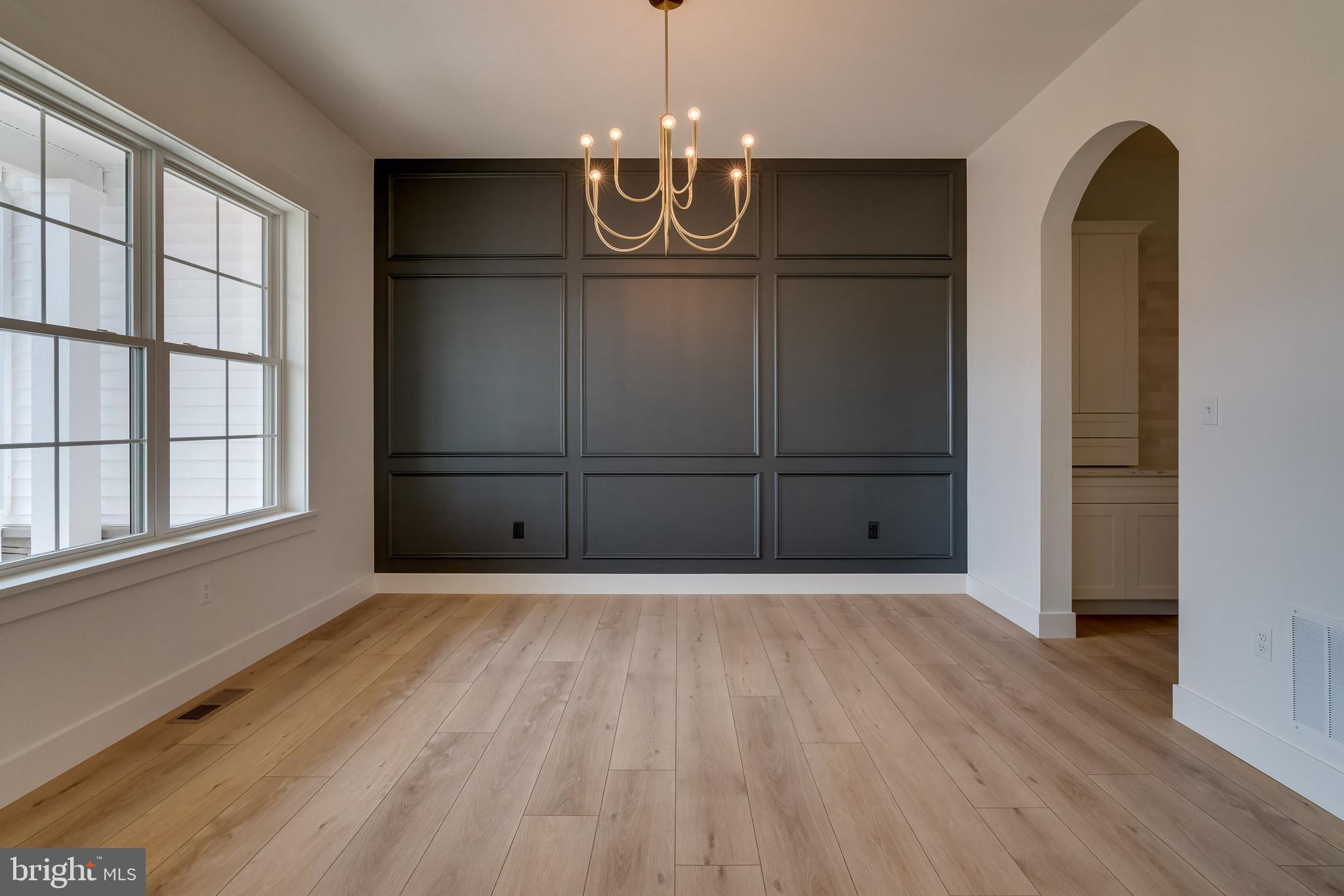 301 Fletcher Drive Lititz, PA 17543 - Photo 4 of 17 a view of wooden floor and windows in a room