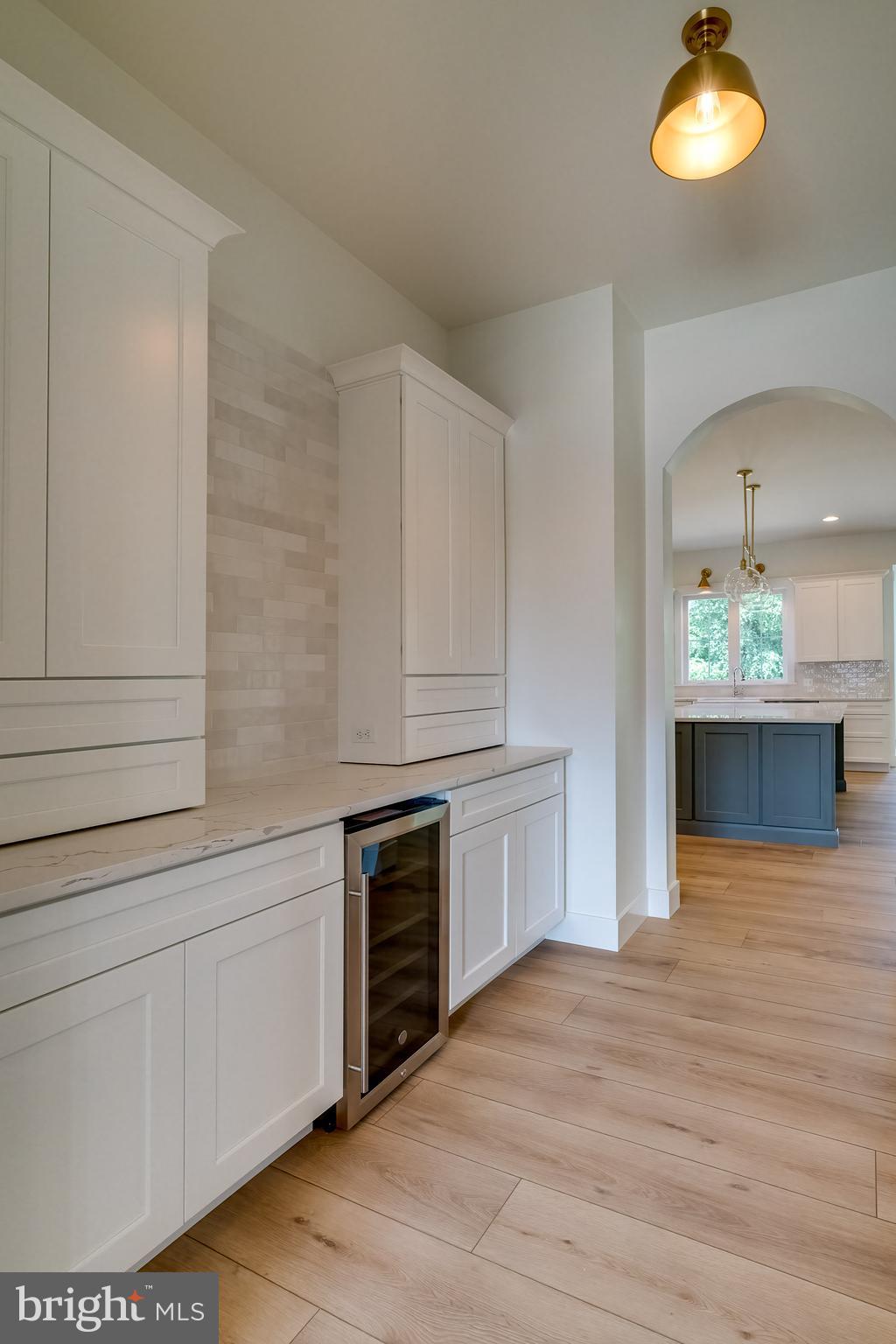 301 Fletcher Drive Lititz, PA 17543 - Photo 6 of 17 a kitchen with stainless steel appliances granite countertop a white cabinets and stove top oven