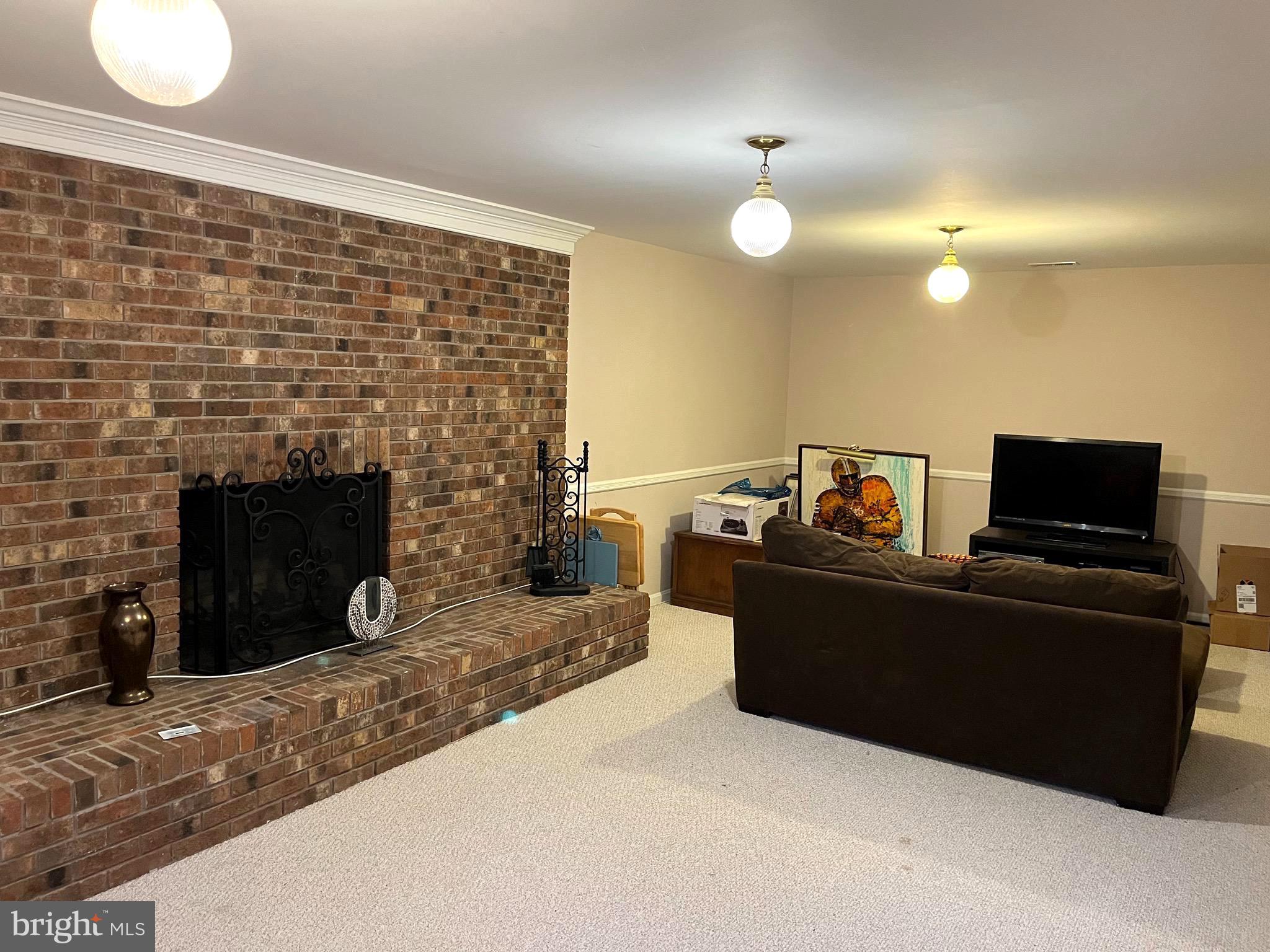 1905 Merrifields Drive Silver Spring, MD 20906 - Photo 12 of 16 Basement Fireplace