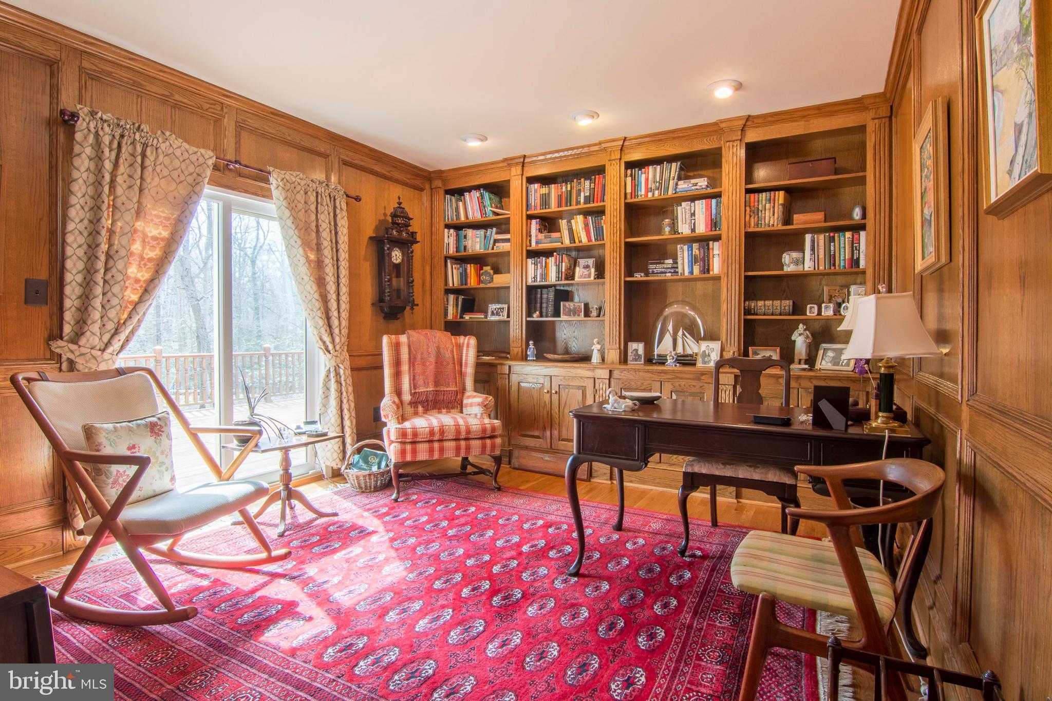 533 Post Oak Road Annapolis, MD 21401 - Photo 26 of 65 Wood paneled library with builtins
