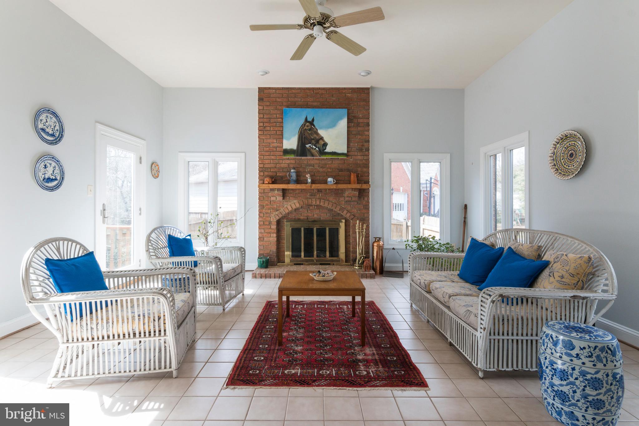 533 Post Oak Road Annapolis, MD 21401 - Photo 8 of 65 Solarium off of living room with fireplace