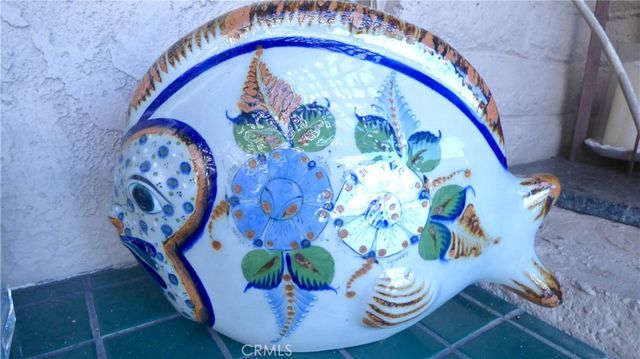 a view of a dining table with plants