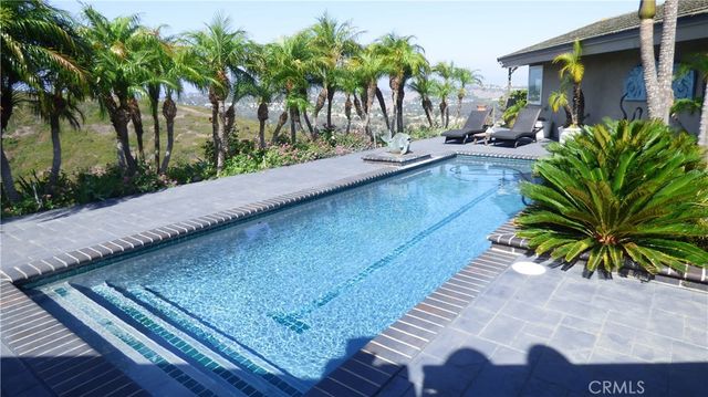 a view of a backyard and a patio