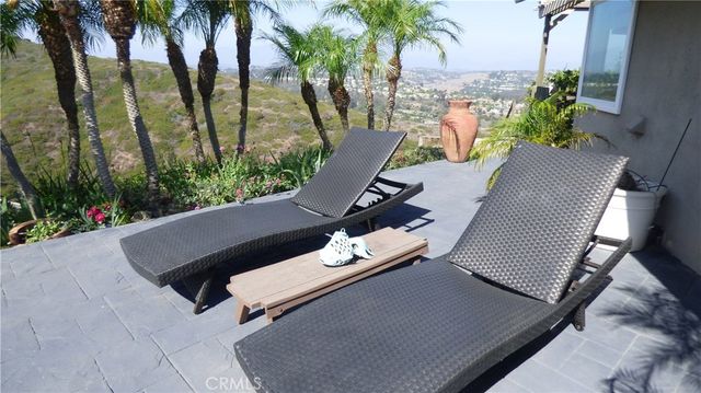 a view of a terrace with a garden
