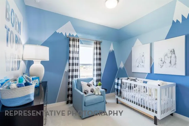 a bedroom with furniture and a wooden floor