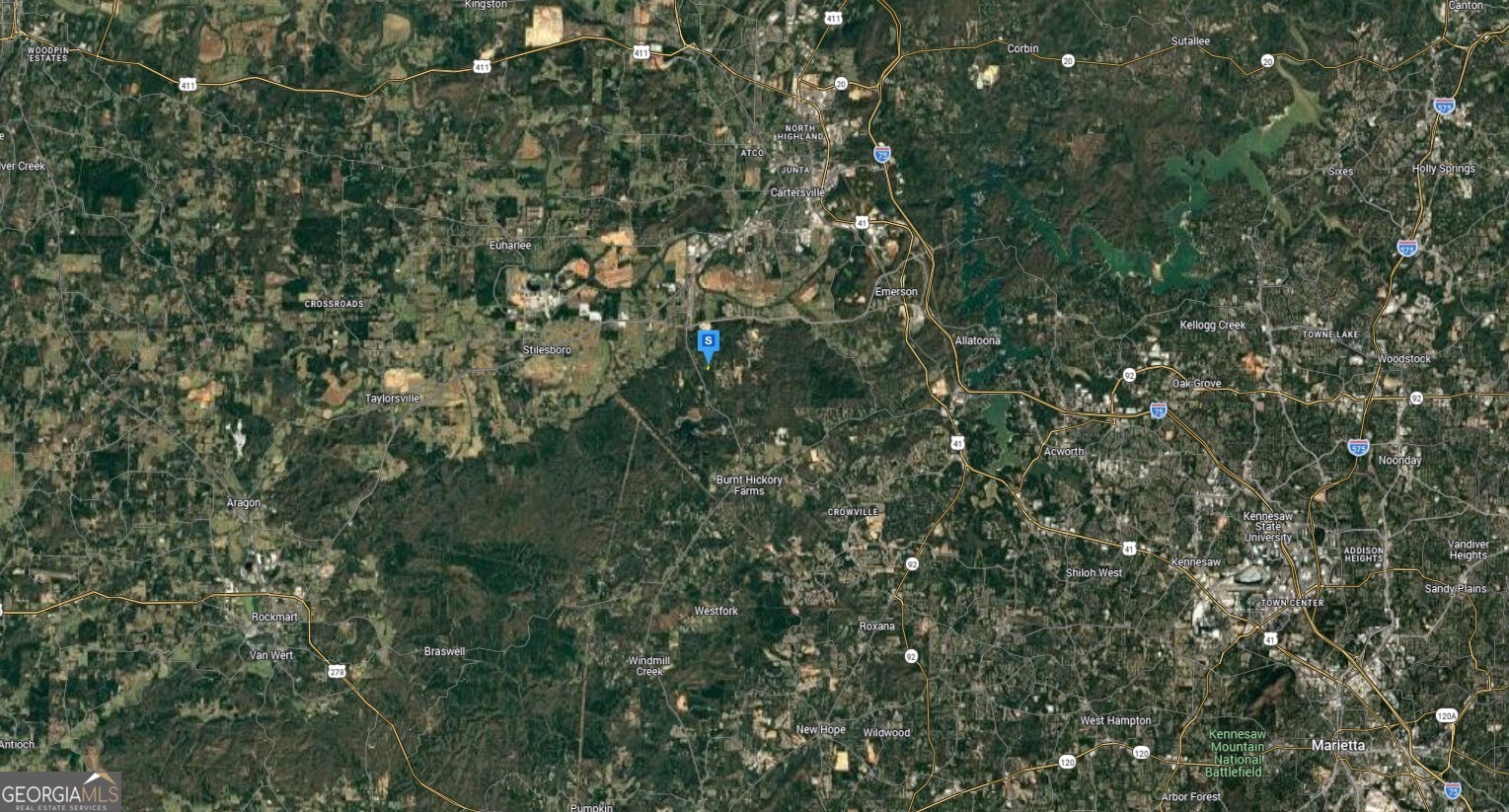 73 Summit Ridge Drive Southeast Cartersville, GA 30120 - Photo 6 of 6 a view of a lush green forest