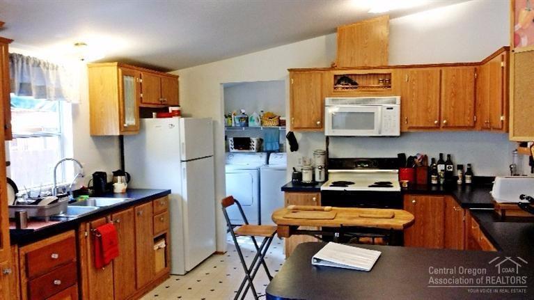 56098 Snow Goose Road Bend, OR 97707 - Photo 4 of 24 Large kitchen with ample storage space a