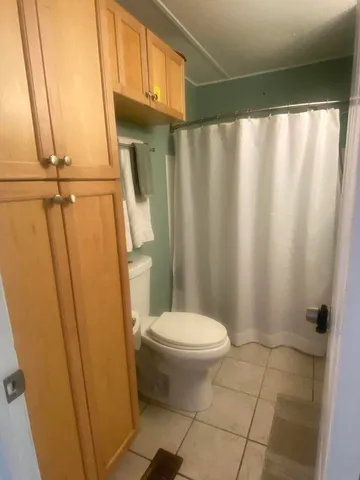 a bathroom with a sink and toilet