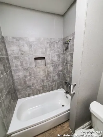 a bathroom with a bathtub