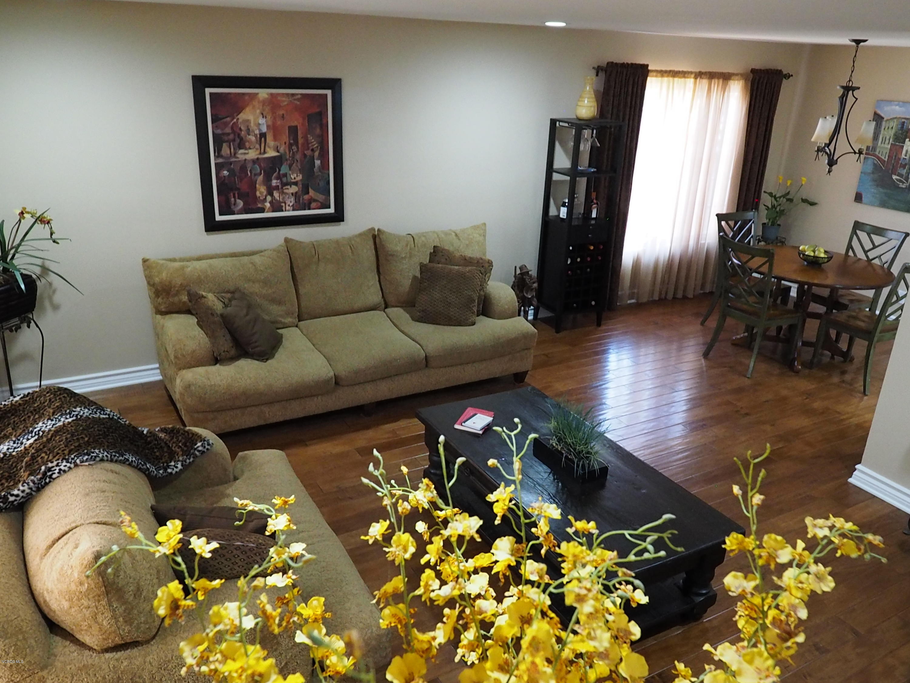 5727 Cochran Street Simi Valley, CA 93063 - Photo 14 of 43 a living room with furniture rug and wooden floor