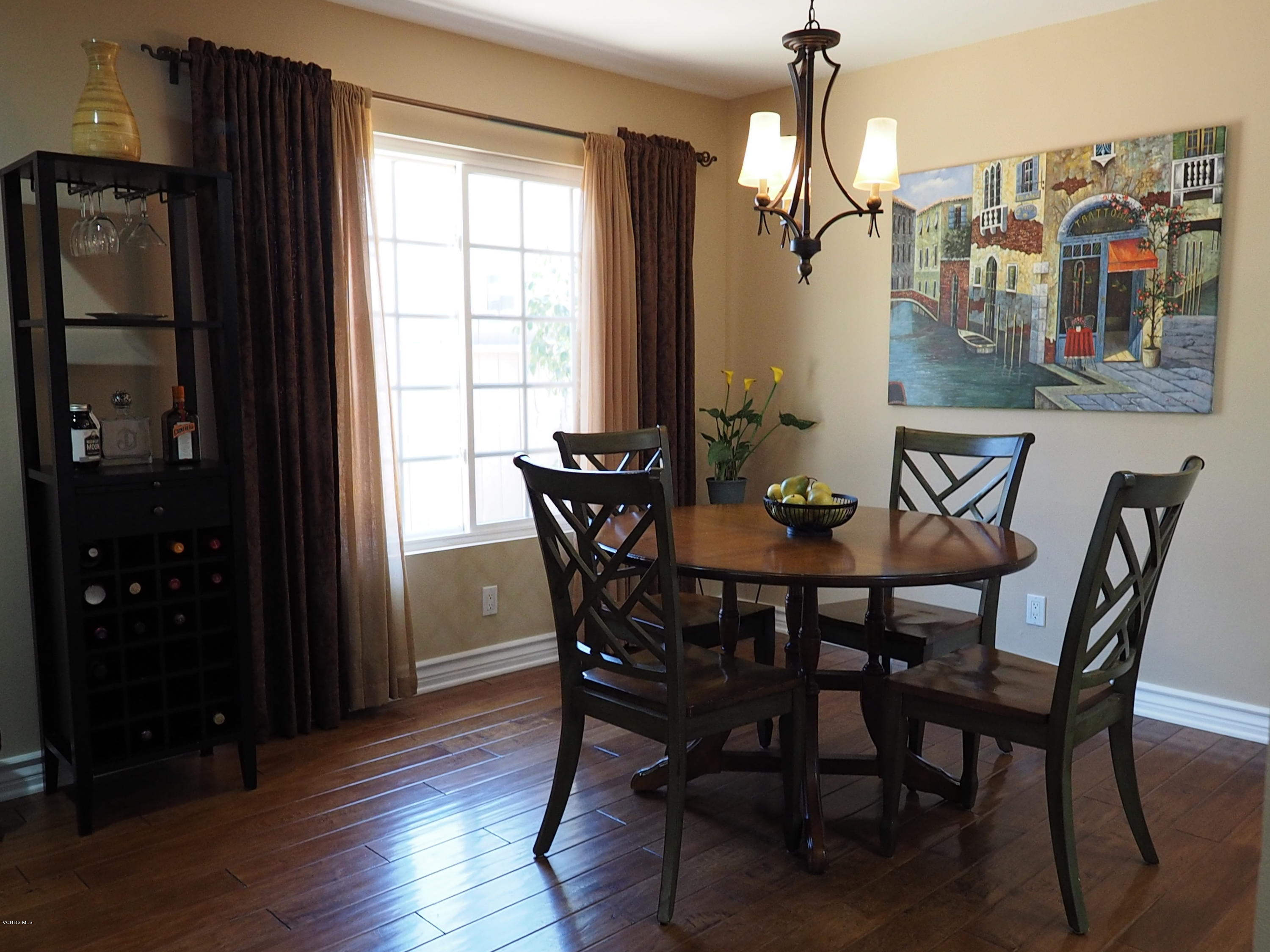 5727 Cochran Street Simi Valley, CA 93063 - Photo 15 of 43 a view of a dining room with furniture and window