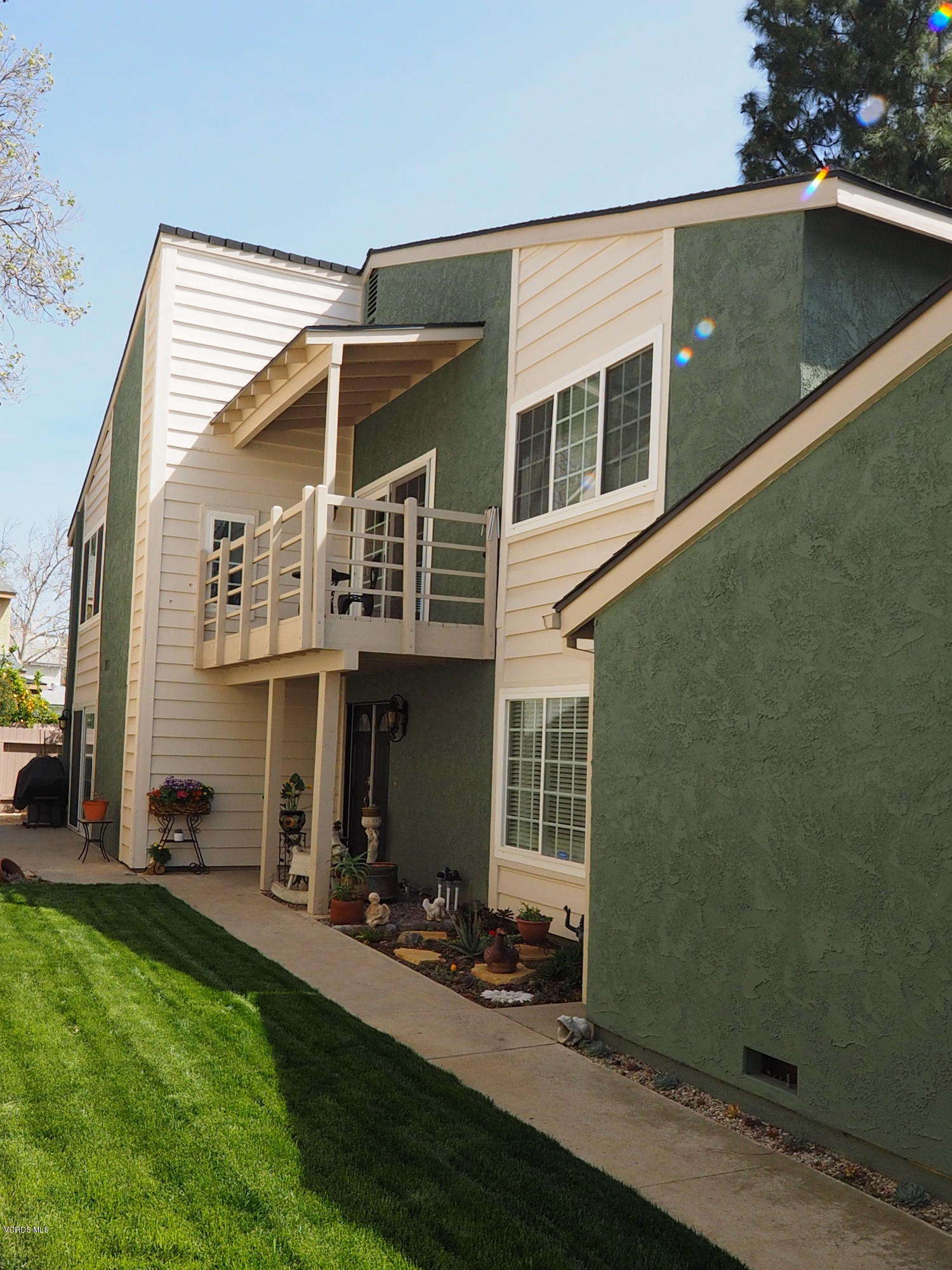 5727 Cochran Street Simi Valley, CA 93063 - Photo 3 of 43 a front view of a house with a yard
